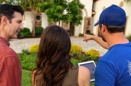 Conserva Irrigation technician helps customers with their irrigation system