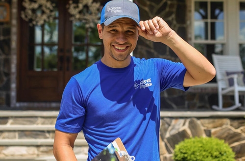 Conserva technician adjusting hat