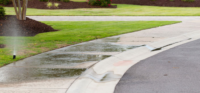 sidewalk with sprinklers