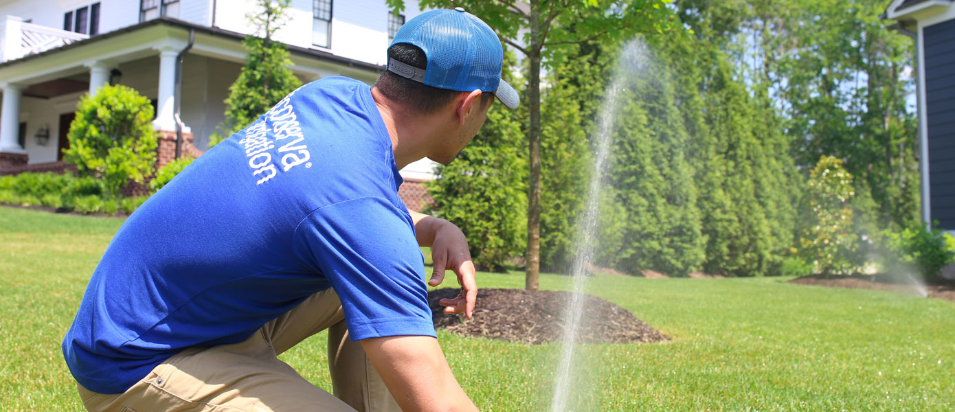 Conserva Irrigation of SW Florida Tech Working on Sprinkler