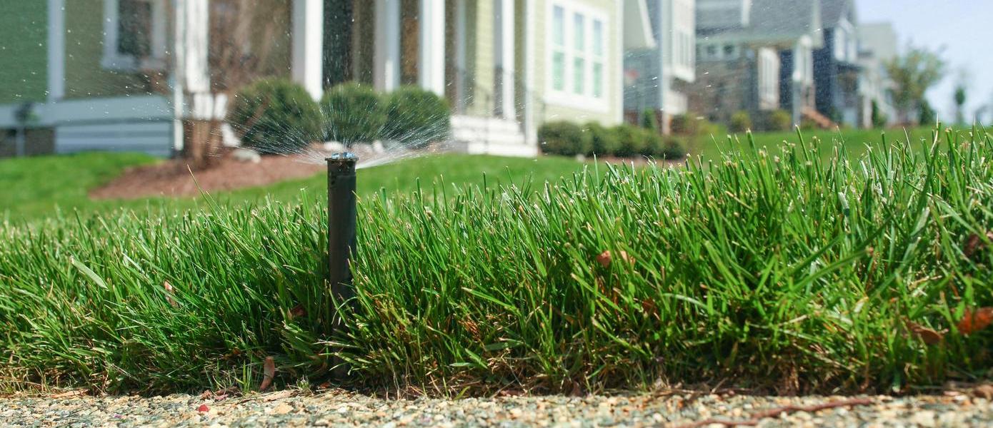 sprinkler system watering lawns